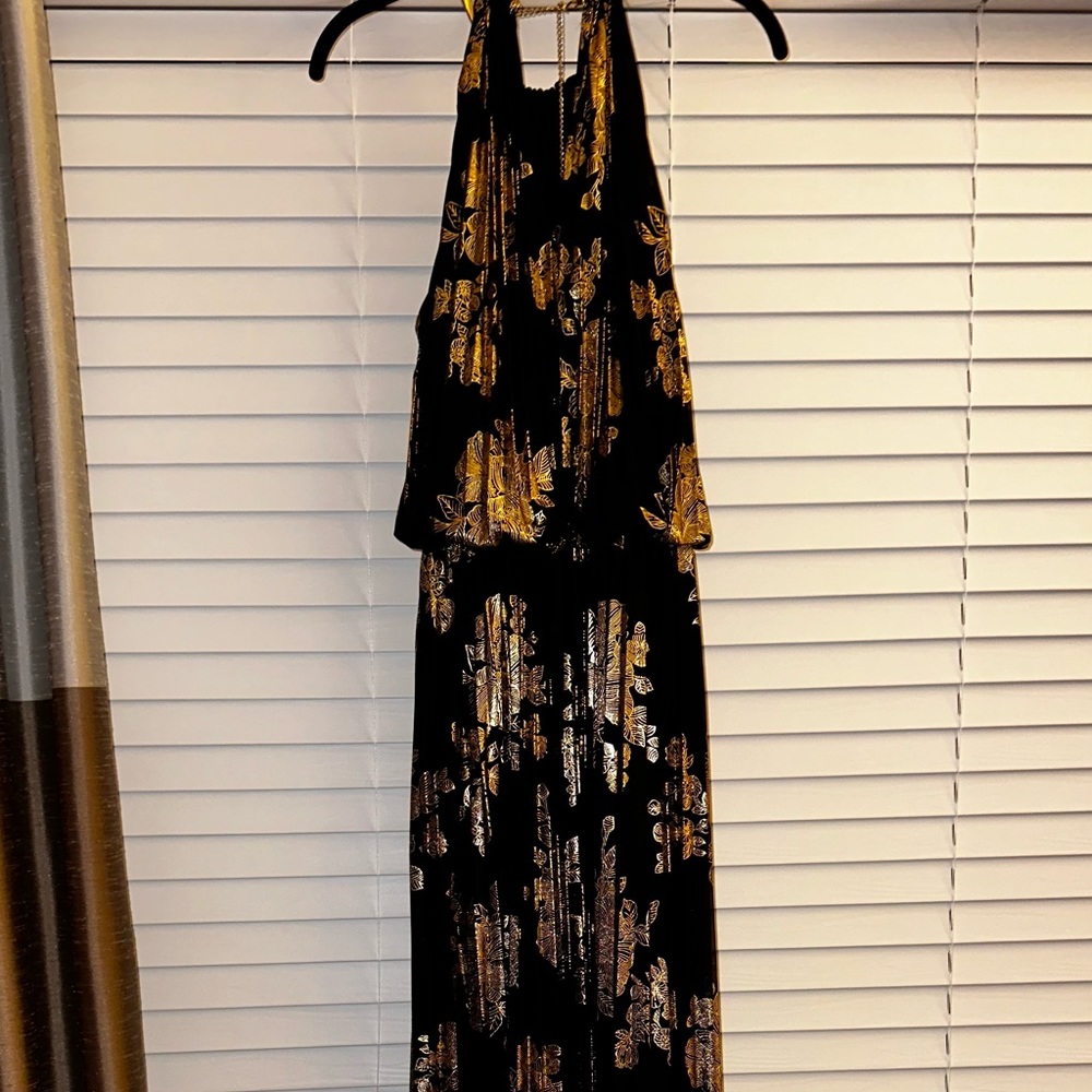 Maxi, sleeveless, halter, pleated dress only worn once and has been cleaned.